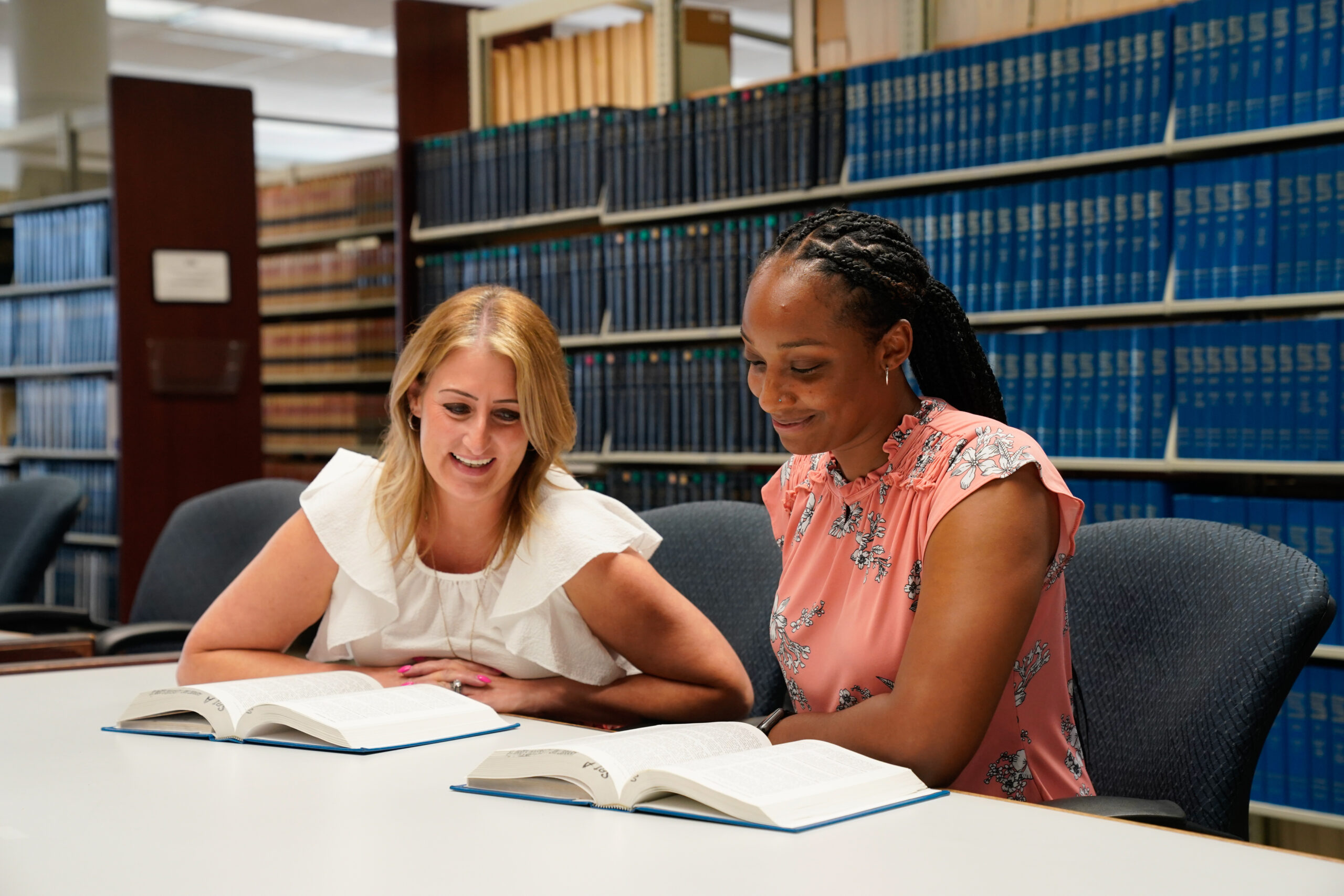 Two women studying diring their first day of law school