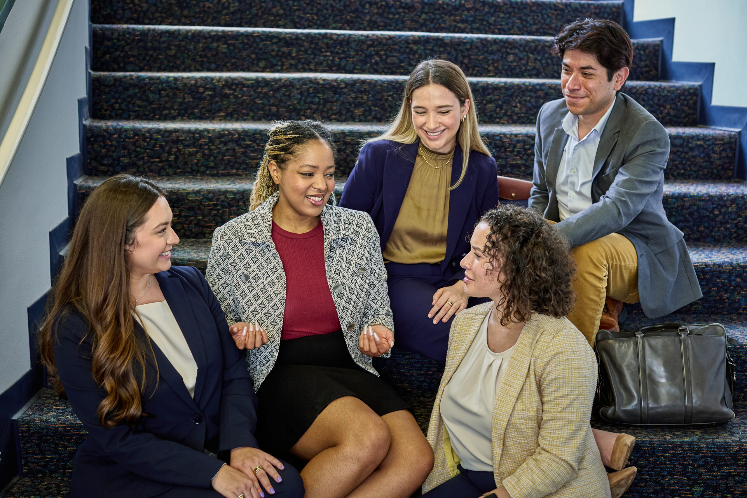 Five Law students work together in the law library.