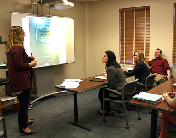 students learning in small classroom