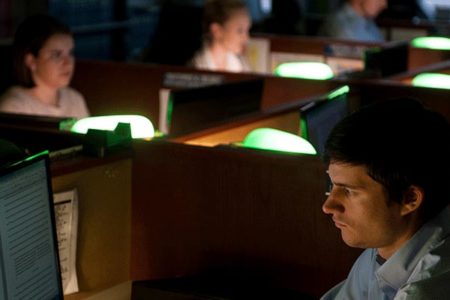 students in computer lab working on journals 