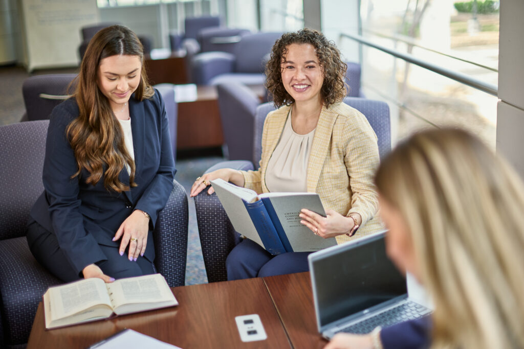 Law students on campus on their computers