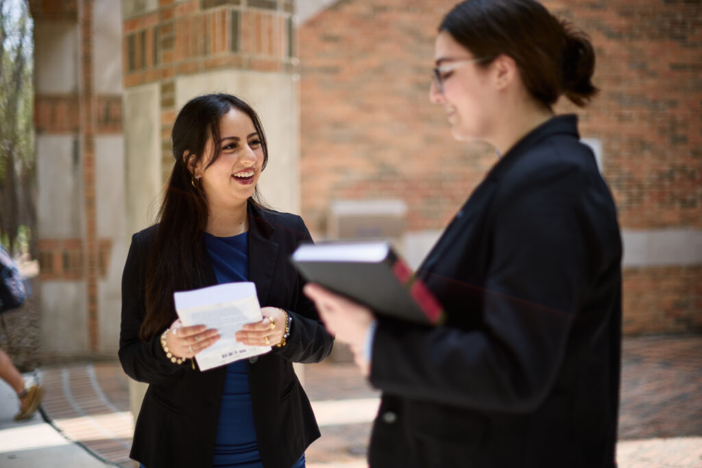 Two Law students having a discussion.
