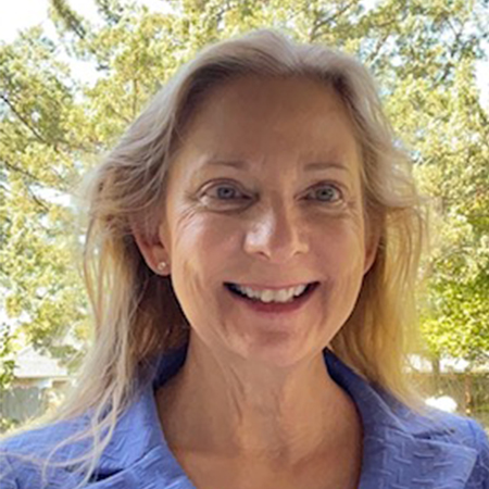 Patricia Moore in blue blouse